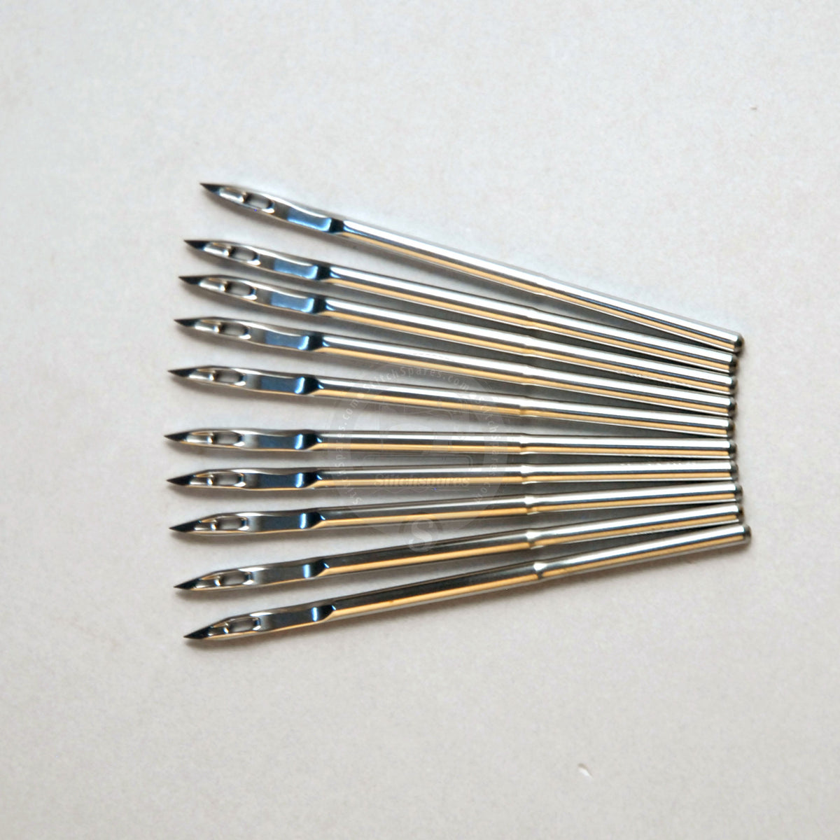 Schmetz Sewing Machine Needles – Spool of Thread